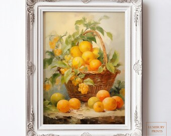 May include: A framed art print featuring a still life of oranges and grapes in a woven basket. The painting has a vintage style with a white ornate frame. The basket is overflowing with fruit and greenery, with some fruit scattered on the table.