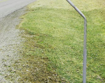 Snowplow and vandal resistant 48" long arm swing away and return to center mailbox post system