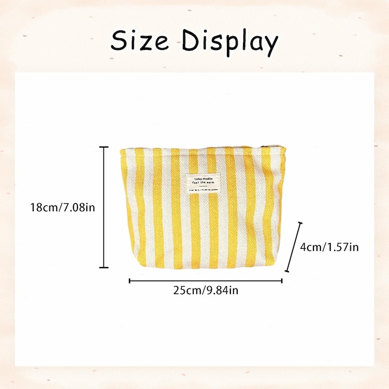 May include: A yellow and white striped cosmetic bag with the text "Size Display". The bag is 18cm/7.08in high, 25cm/9.84in wide, and 4cm/1.57in deep. A small label is sewn on the front.