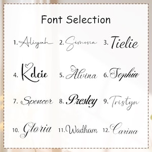 May include: A white background displays a "Font Selection" guide. Twelve names are written in different cursive fonts, numbered from 1 to 12. The names include Aliyah, Simona, Tielie, Kelcie, Alvina, Sophia, Spencer, Presley, Tristyn, Gloria, Wadham, and Carina.