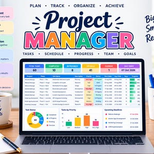 May include: A laptop screen displaying a project management dashboard with colorful charts, task lists, and status metrics. The surrounding area includes a mug with text, a notebook with a pen, a pencil holder with pens, and a stack of colorful books.