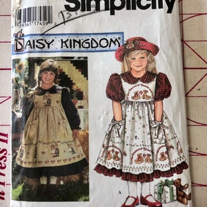 Simplicity 9977 Daisy Kingdom pattern child&#39;s dress size AA with bonus doll dress pattern