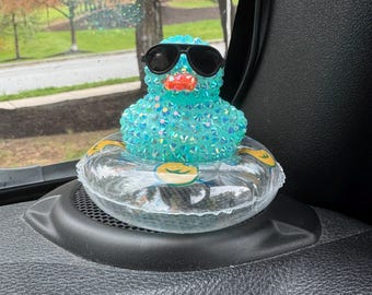 Bedazzled Duck: Sunglasses and Inner Tube