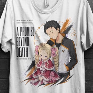 May include: A white short-sleeve t-shirt featuring a graphic illustration of two anime characters. The text reads A PROMISE BEYOND DEATH, I'LL ALWAYS COME BACK FOR YOU, and other small print. The design includes a male character in a jacket and a female character in a red dress.