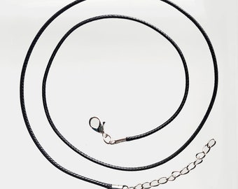 May include: A black cord necklace with a silver clasp and an extension chain.
