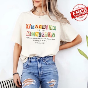 May include: Cream-colored t-shirt with the text "TEACHING is my MINISTRY" in colorful block letters. Below the title is the quote "Whatever you do, work at it with all your heart, as working for the Lord Colossians 3:23".