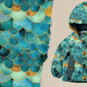Könnte beinhalten: Eine blaue und goldene Kapuzenjacke mit einem Meerjungfrauen-Schuppenmuster. Die Jacke hat einen Reißverschluss und zwei Taschen.