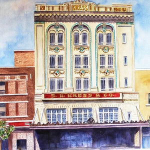 May include: A watercolour painting of a vintage shop front with the name "S.H. Kress & Co." above the entrance. The building has a white facade with red accents and large windows. The shop front is decorated with ornate details and a sign with the company's name.