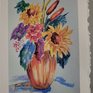 May include: A watercolor painting of a bouquet of sunflowers, red flowers, and green leaves in a brown vase. The painting is signed by the artist, Suzanne Townson.