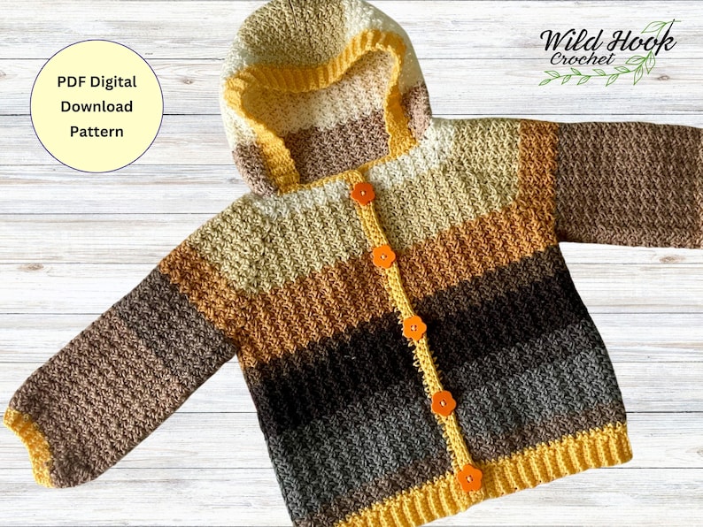 May include: A striped hooded cardigan with a yellow, brown, and gray color scheme. The cardigan has a button closure and is crocheted. The text "PDF Digital Download Pattern" is visible in the top left corner of the image. The text "Wild Hook Crochet" is visible in the top right corner of the image.