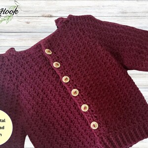 May include: A burgundy crochet cardigan with wooden buttons. The pattern is a simple stitch with a textured look. The text "PDF Digital Download Pattern" is in the lower left corner of the image.