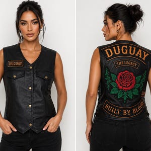 May include: Black leather vest with a V-neck, button closure, and two front pockets. The vest has a small rectangular patch that says "DUGUAY". The back of the vest features a large patch with a rose and the words "DUGUAY THE LEGACY BUILT BY BLOOD".