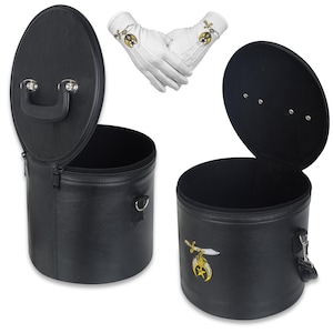 May include: Black leather hat cases with open lids and a pair of white gloves with embroidered emblems. The cases have zippers and handles. The gloves are white with gold and black embroidery.