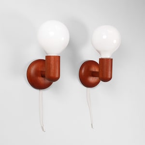 Pair of Teak Wood Wall Lamps | Vintage Scandinavian Modern Style Sconces with Pull Cord | West Germany 1960s 1970s