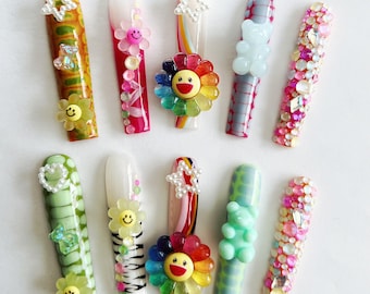 Rainbow 3D False Nails with Kawaii Y2K Statement Charms and Colorful Handmade Nail Art