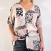 see more listings in the Short Sleeve Tops section