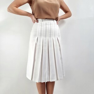 Mini white pleated midi skirt best sale