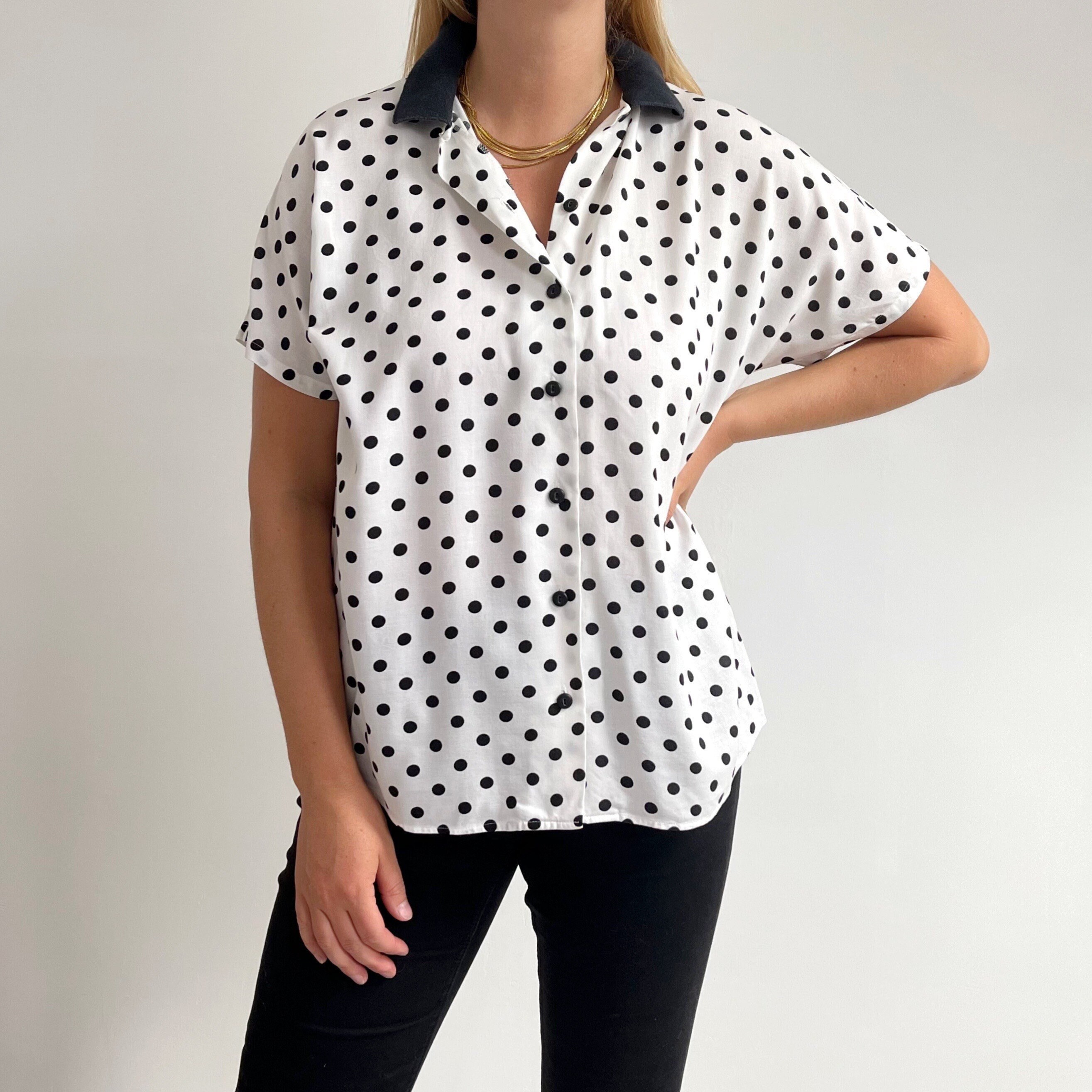 white polka dot blouse