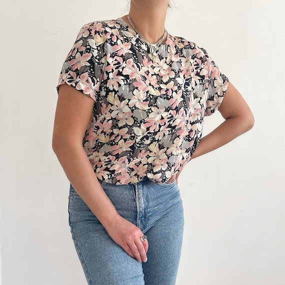 blusa negra con mezclilla