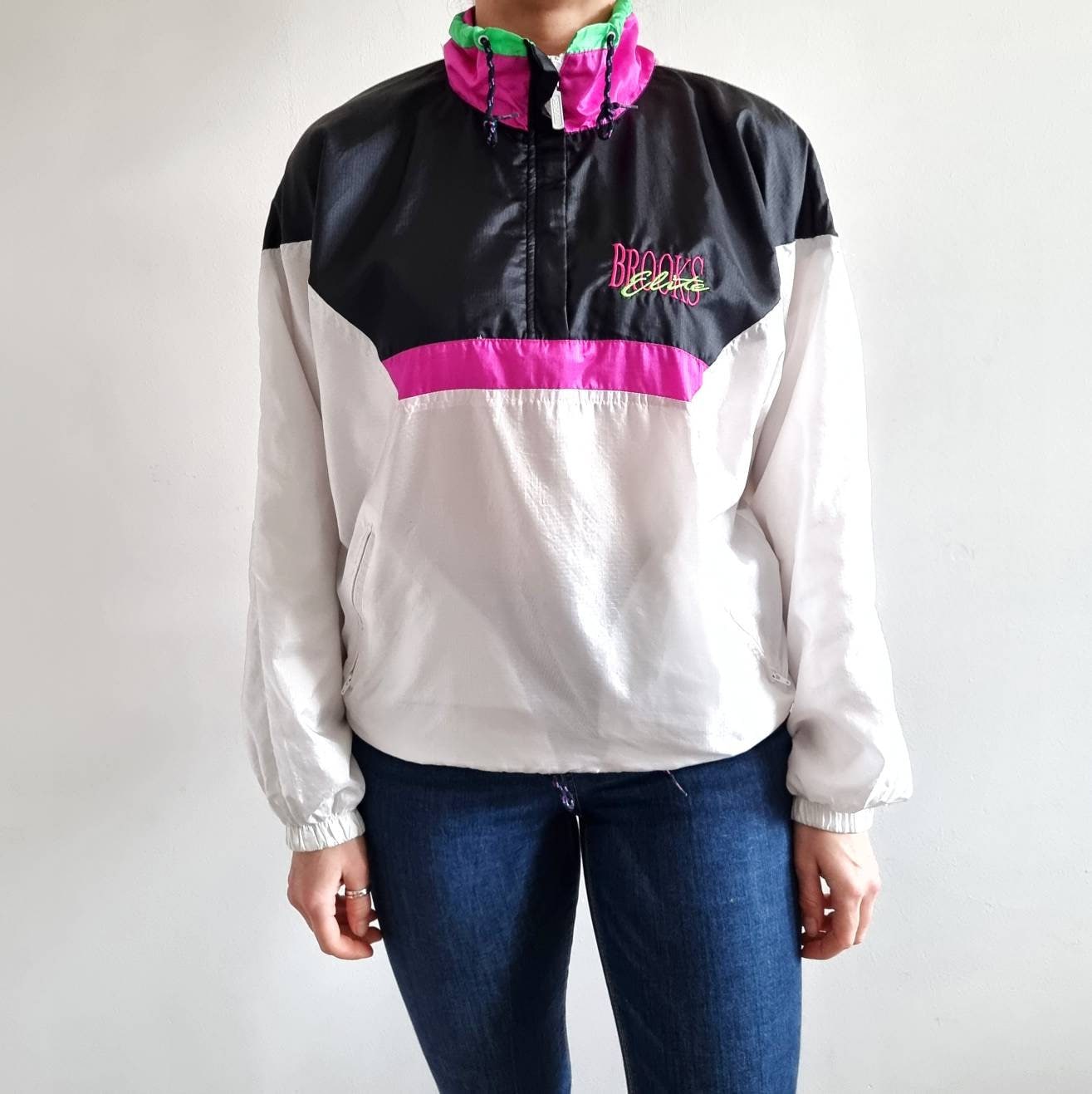 Pink windbreaker black and white sale