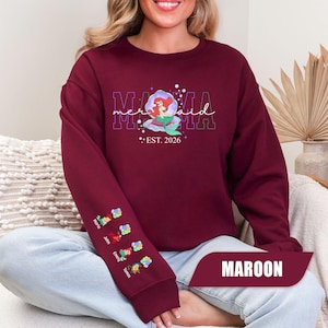 May include: A set of three ceramic mugs with a speckled, matte finish. The mugs are in shades of cream, light gray, and dark gray. Each mug has a simple, minimalist design, perfect for coffee or tea.