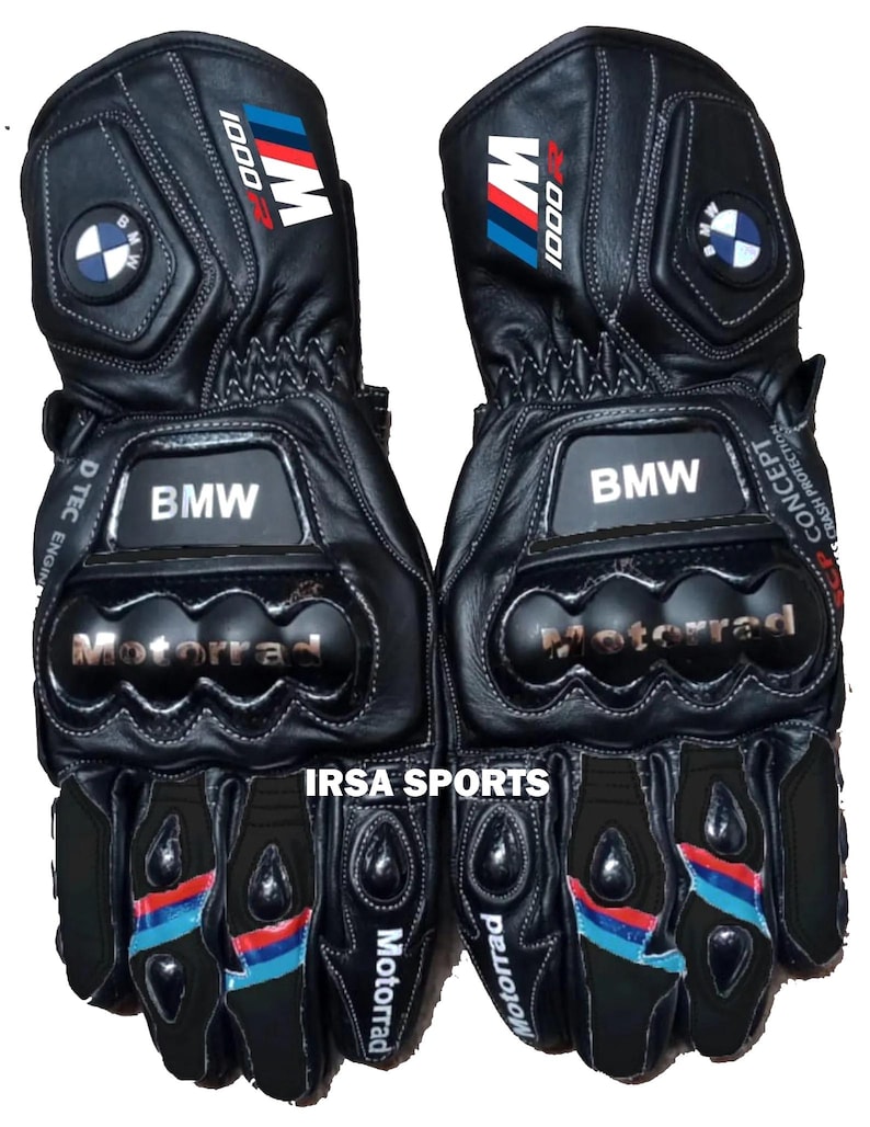 May include: Pair of black leather motorcycle gloves with BMW and Motorrad branding. Features include blue, red, and white accents, along with the text "1000" and "IRSA SPORTS".