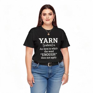 May include: Black t-shirt with the word "YARN" in white, and a definition: "An item to which the word 'ENOUGH' does not apply."