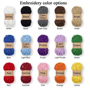 May include: Fifteen skeins of yarn arranged in three rows, each with a paper label identifying the colour. Colours include white, black, dark grey, brown, khaki, blue, light blue, purple, light purple, green, red, carmine, pink, orange, and yellow.