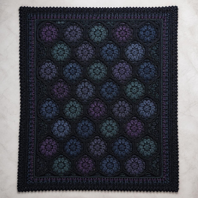 May include: A rectangular crochet blanket featuring a repeating pattern of hexagonal floral motifs in shades of dark purple, teal, and navy blue. The blanket is bordered by a thick, dark black crocheted edge with a textured, scalloped trim.