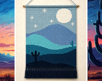 May include: A rectangular woven wall hanging featuring a desert landscape at night. The design displays layered blue and teal hills, two dark cacti silhouettes, a large white moon, and small white star icons, finished with a dark blue fringe.