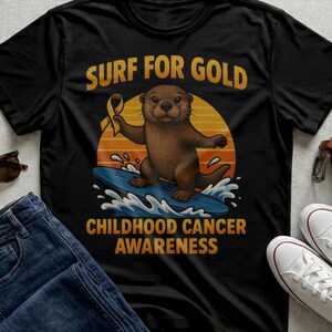 Surfing Otter Gold Ribbon Shirt, Childhood Cancer Awareness Tee, Pediatric Support