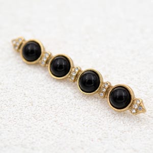Vintage gold 1928 brooch Faux black onyx long bar brooch Clear crystal paste brooch