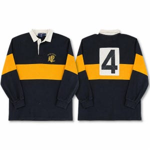 May include: A long-sleeve rugby shirt in navy blue and yellow with a white collar and placket. The front features a yellow Polo Sport logo, while the back displays a large white square patch with the black number 4 printed in the center.