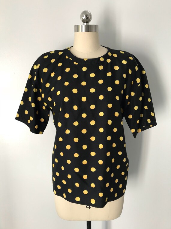 yellow polka dot blouse