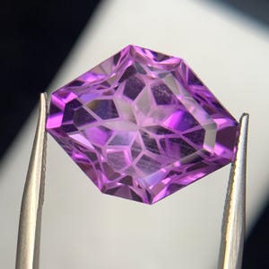 Natural Amethyst Gemstone: 13.79 Carat Star Cut, Untreated Purple Stone