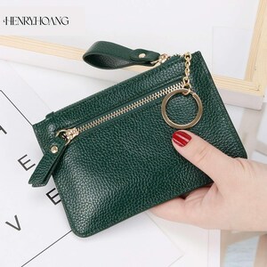 Cartera de moda para mujer con muchos compartimentos, práctico llavero y diseño compacto.
