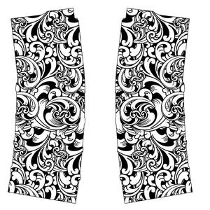 May include: Two black and white decorative panels with a swirling, ornate floral pattern. The design features a repeating motif of stylized leaves and curls, creating a symmetrical and elegant aesthetic. The panels are rectangular with a slight taper.