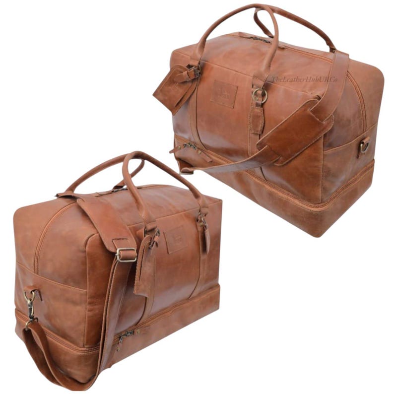 May include: Two brown leather duffel bags with top handles, shoulder straps, and side pockets. The bags have a rectangular shape with a base and are made of a distressed leather material. The bags have zippers and metal hardware.