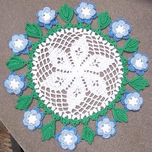 9.5 inch round handmade cotton crochet doily with blue flowers  -- 3667