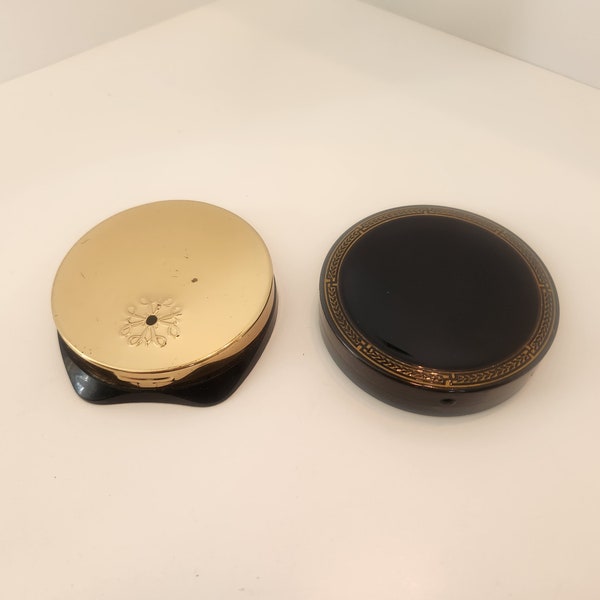 Lot of TWO Black and Gold Vintage Powder Compacts -- Avon