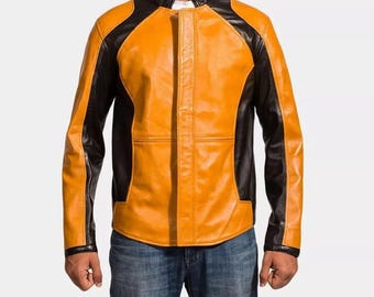 May include: A two-tone leather jacket in orange and black. The jacket features a stand-up collar, a front zipper, and black panels on the shoulders and sleeves. The model is wearing blue jeans. The jacket is a stylish outerwear option.