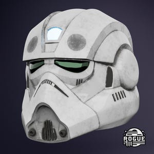 May include: White plastic helmet with a visor and a blue light on the top. The helmet has a weathered look with grey and black accents.