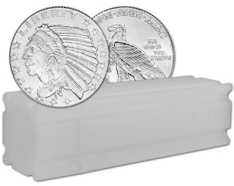 May include: Two silver coins with detailed engravings of a Native American in a headdress and an eagle. The coins are partially visible, resting on a white rectangular coin tube. The coins are marked with the words "LIBERTY" and "IN GOD WE TRUST".