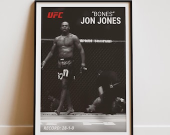 May include: Black and white poster featuring a mixed martial arts fighter in the octagon. The poster has the text "UFC" and "JON JONES" in red. The fighter's nickname, "BONES", is in white. The fighter's record, "RECORD: 28-1-0", is at the bottom of the poster.