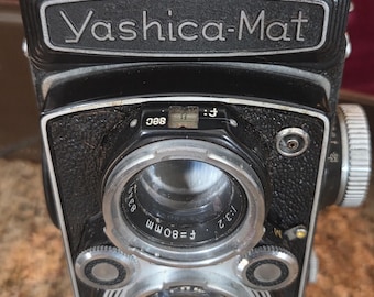 Vintage Yashica-Mat twin-lens reflex (TLR) camera, first introduced around 1957.   Medium format film camera using 120 film. 