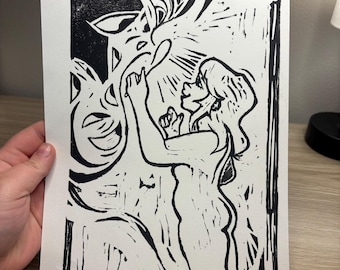 May include: A black and white linocut print on paper featuring a stylized figure with long hair standing in profile, reaching toward a large, abstract, flame-like shape. The artwork uses bold, high-contrast lines to define the forms.