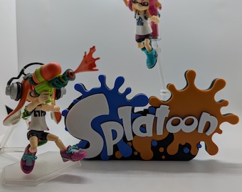 Logotipo del cartel de exhibición del videojuego Splatoon