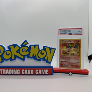 Panneau d'affichage du logo du JCC Pokémon pour le jeu de cartes à collectionner