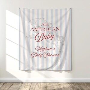 May include: A baby shower banner with a light blue and white striped background. The banner features a cowboy riding a horse with the text "ALL AMERICAN Baby Meghan's Baby Shower" in burgundy script.