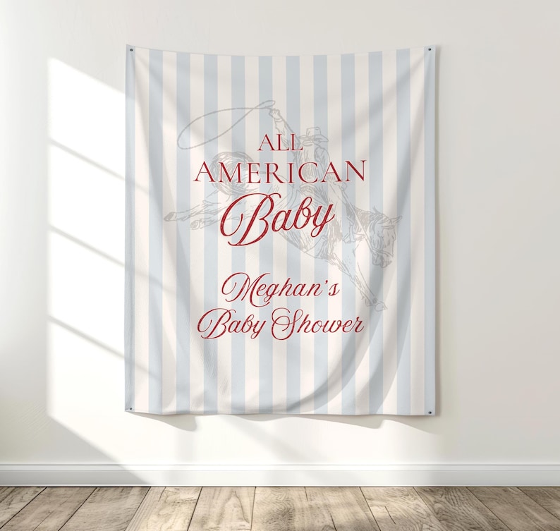 May include: A baby shower banner with a light blue and white striped background. The banner features a cowboy riding a horse with the text "ALL AMERICAN Baby Meghan's Baby Shower" in burgundy script.